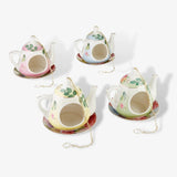 ceramic teapot bird feeder by Fallen Fruits