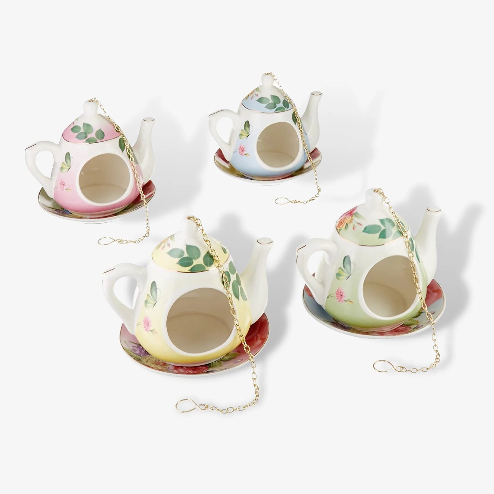 ceramic teapot bird feeder by Fallen Fruits