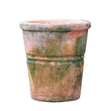 Vintage terracotta pot on a white background