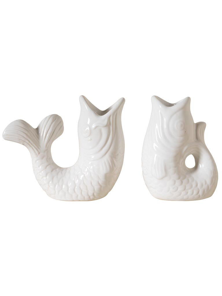 Two white ceramic mermaid tail vases on a white background
