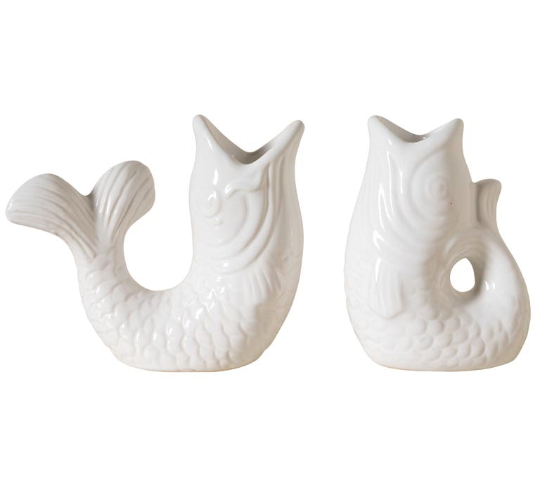 Two white ceramic mermaid tail vases on a white background