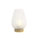 Table lamp with white shade and gold base on a white background