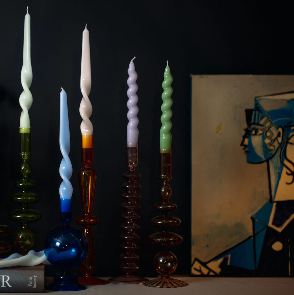 Spiral taper candles and glass candlesticks by Maegen