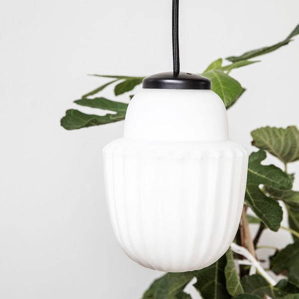 white glass acorn shaped pendant light by House Doctor