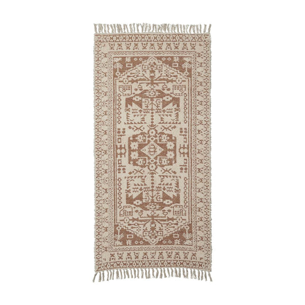 patterned woven soft pink rug 