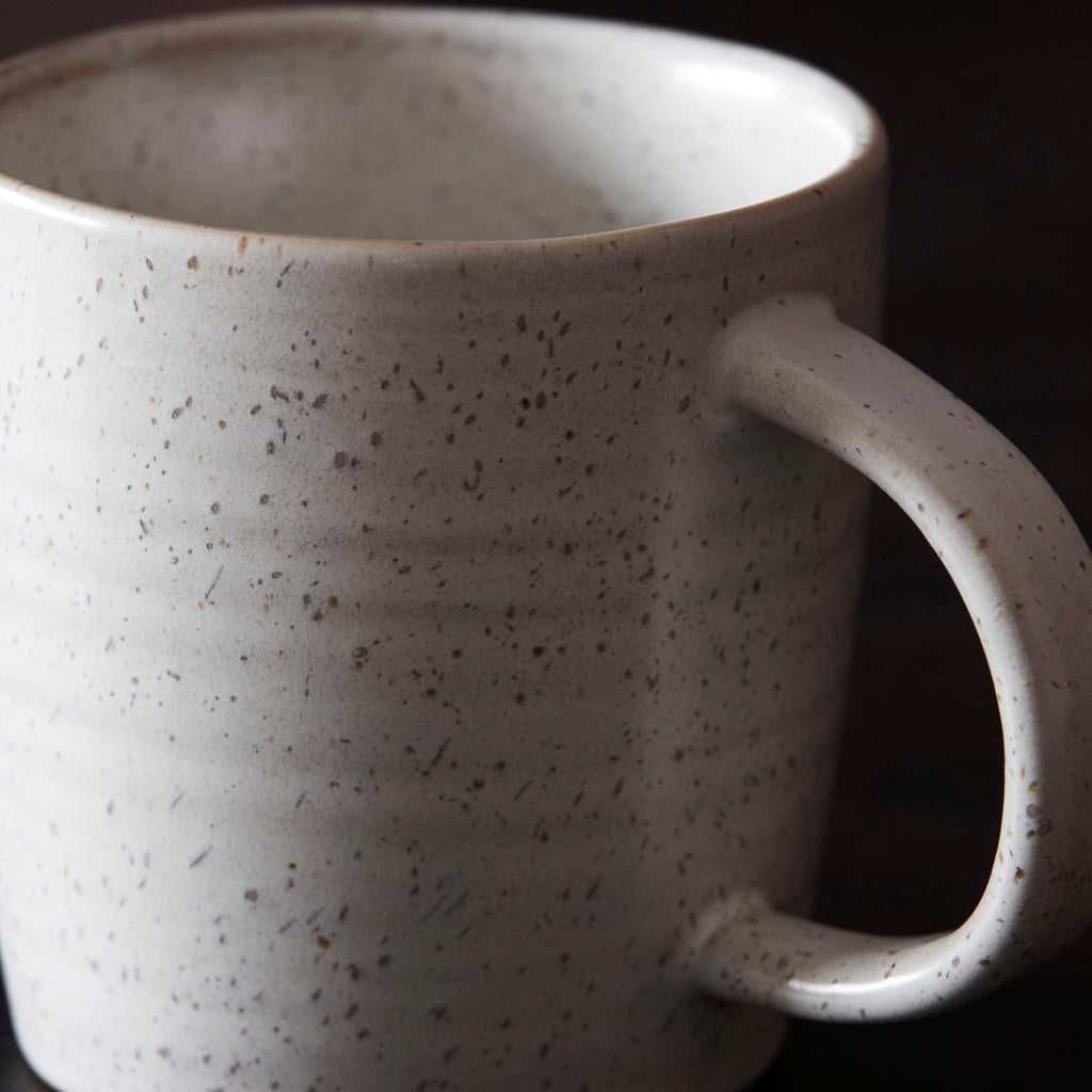 speckled glaze on the white mug Pion 