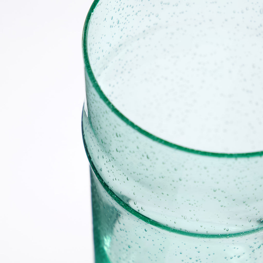 detail of aqua blue drinking glass by House Doctor 