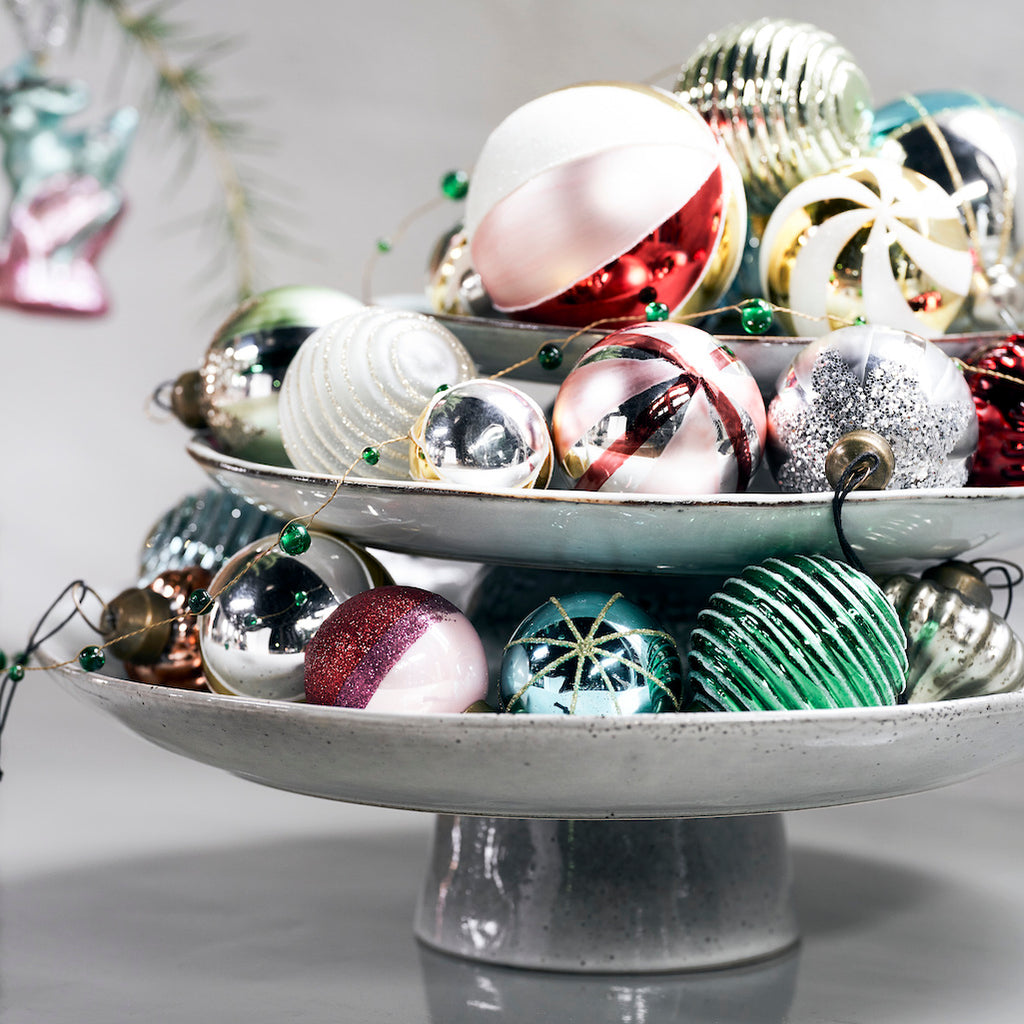 assortment of glass Christmas baubles by House Doctor