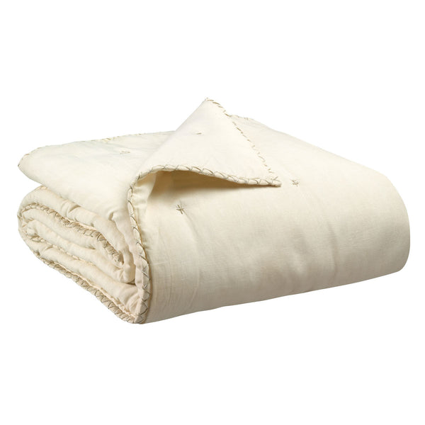 Nala quilted linen throw with embroidered edging