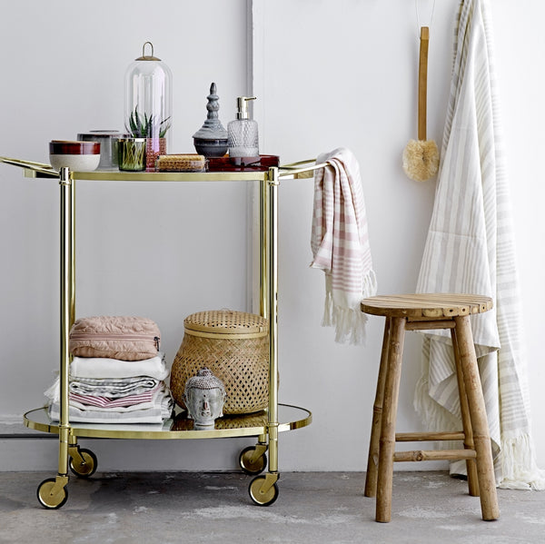 gold drinks trolley with glass shelves by Bloomingville 