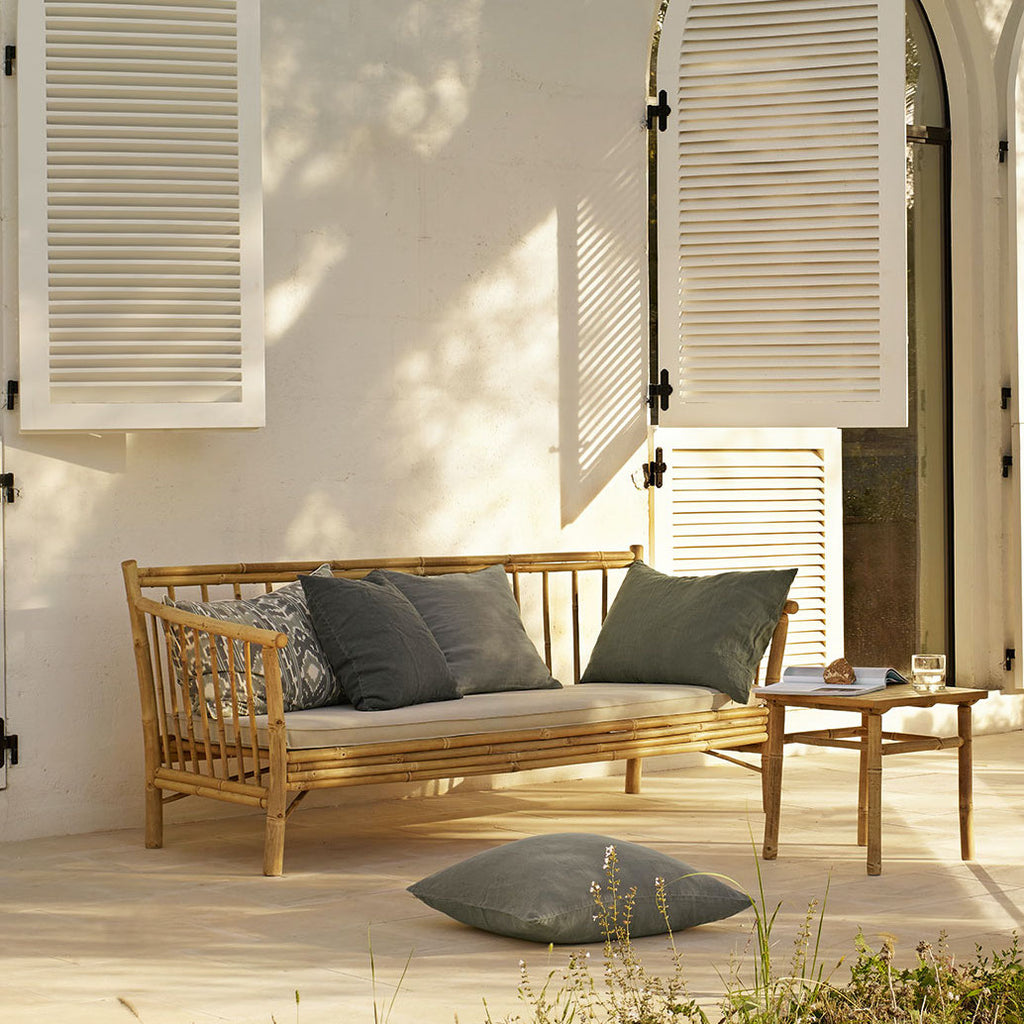 Bamboo sofa by Tine K home with sand cushion