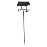 black metal bird feeder by Fallen Fruits