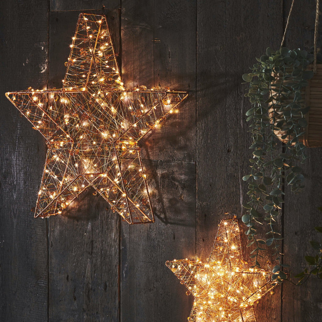 large copper Christmas star light with LED lights 