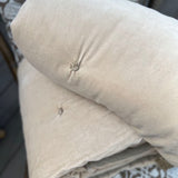 Knotted velvet throw in sand 