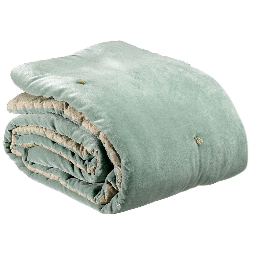Green quilted throw by Vivaraise with hand knotted detail 