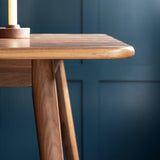 detail of walnut wood table