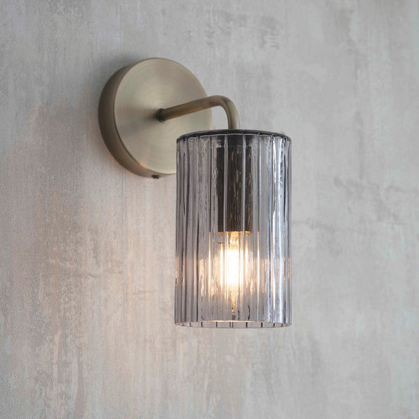 Clarenden grey glass wall light with brass fitting 