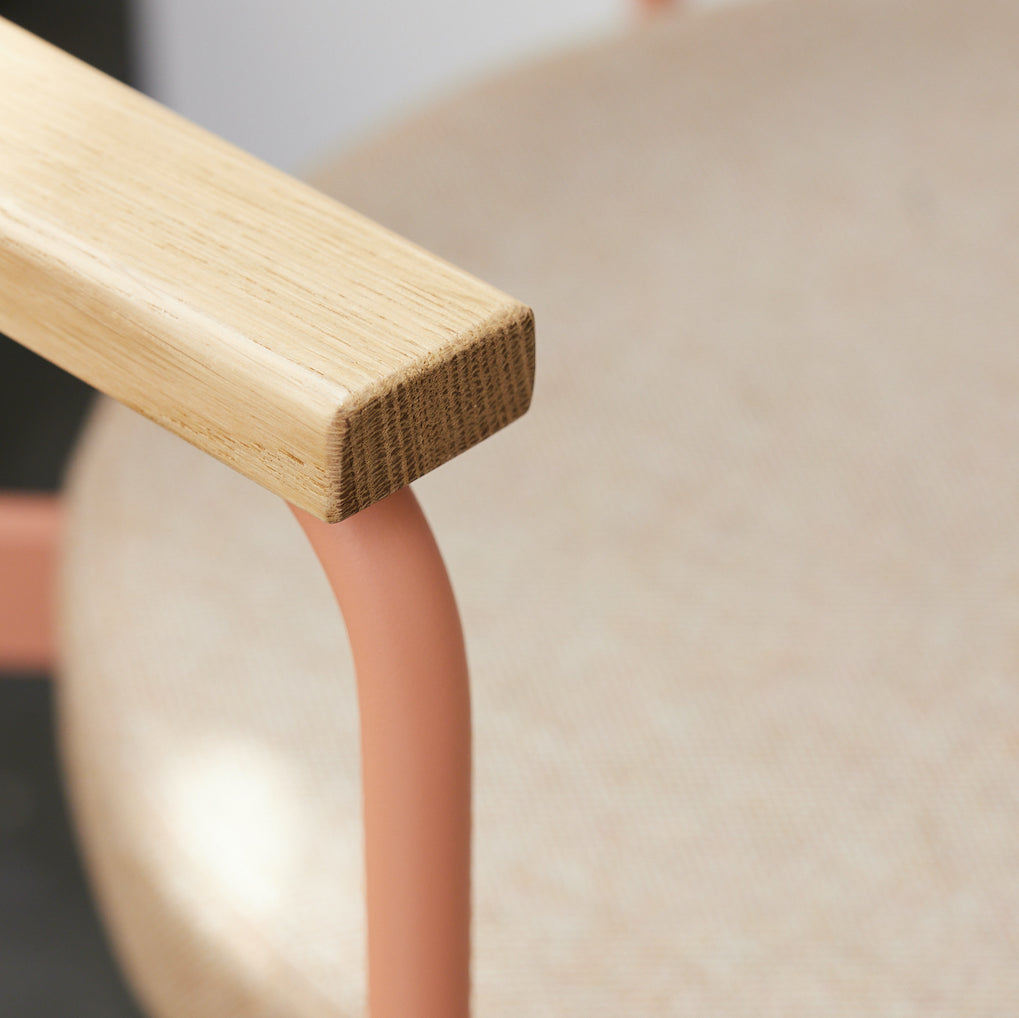 detail of wooden arm on dining arm chair