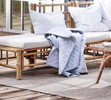 Mandisa bamboo outdoor module sofa with white cushions 