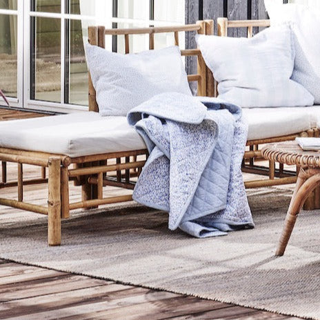 Mandisa bamboo outdoor module sofa with white cushions 