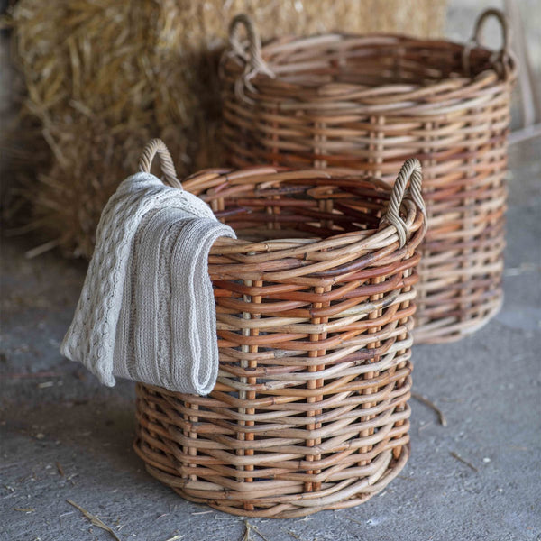 large round rattan baskets for logs or laundry 