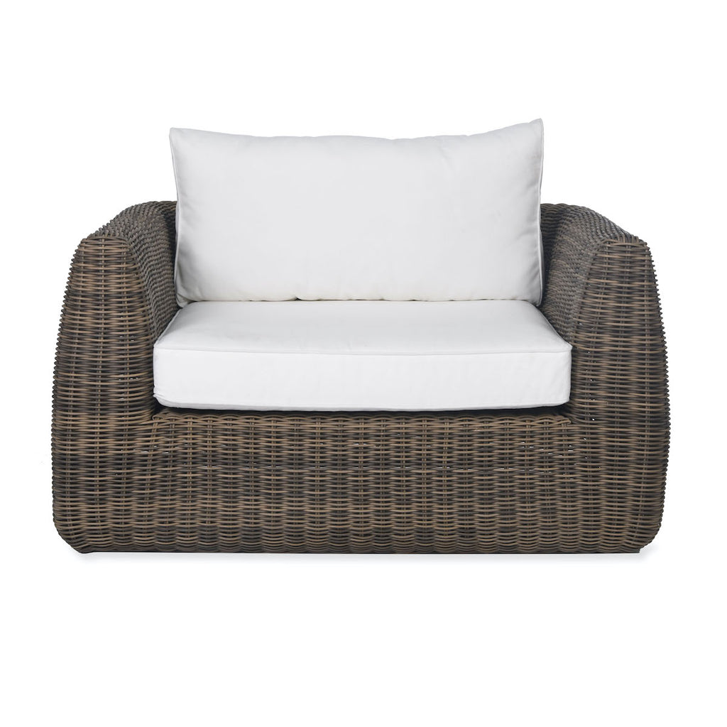 Skala garden lounge chair from PE rattan with white cushions