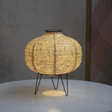 yellow pumpkin solar light on table