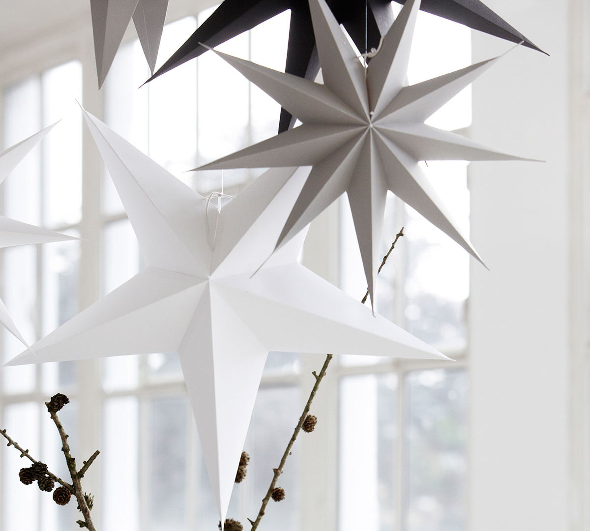 Hanging paper stars by House Doctor 