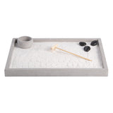 zen garden set with sand, rake and pebbles