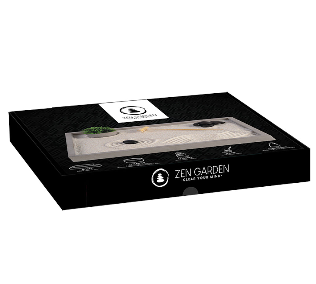 zen garden set with sand, rake and pebbles