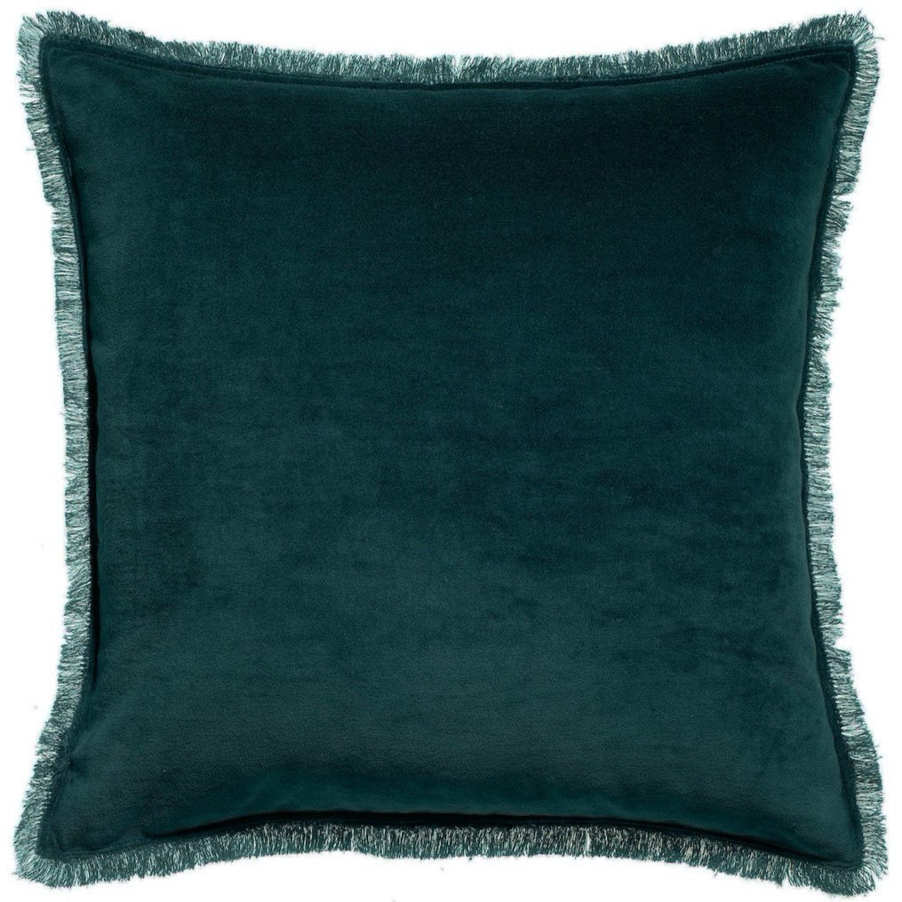 teal velvet cushion with fringe edges