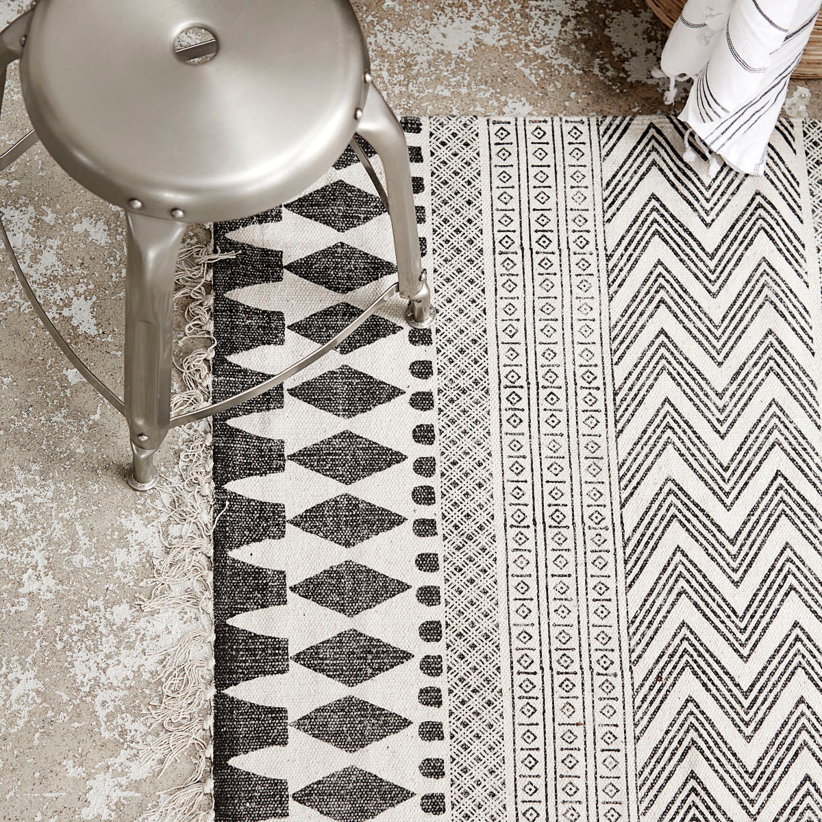 monochrome rug with geometric design
