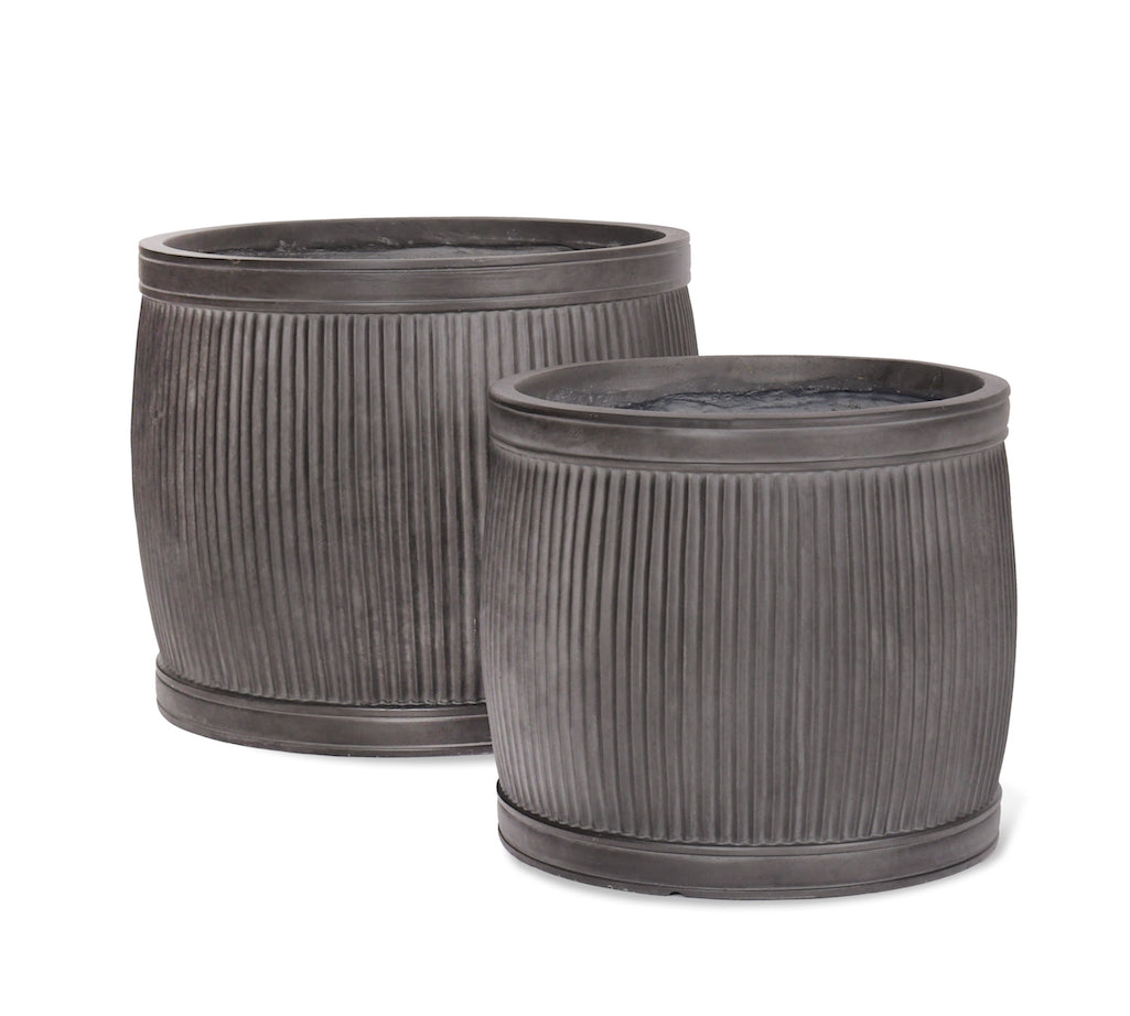 Ribbed round planters made from fibre clay 