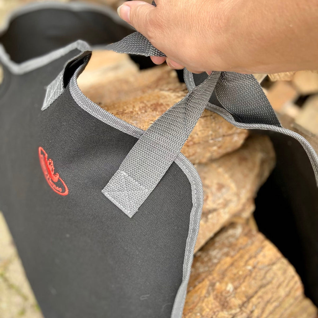 detail of handle on black log carrier