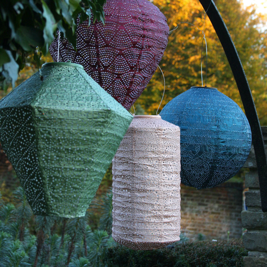 group of several solar garden lanterns 