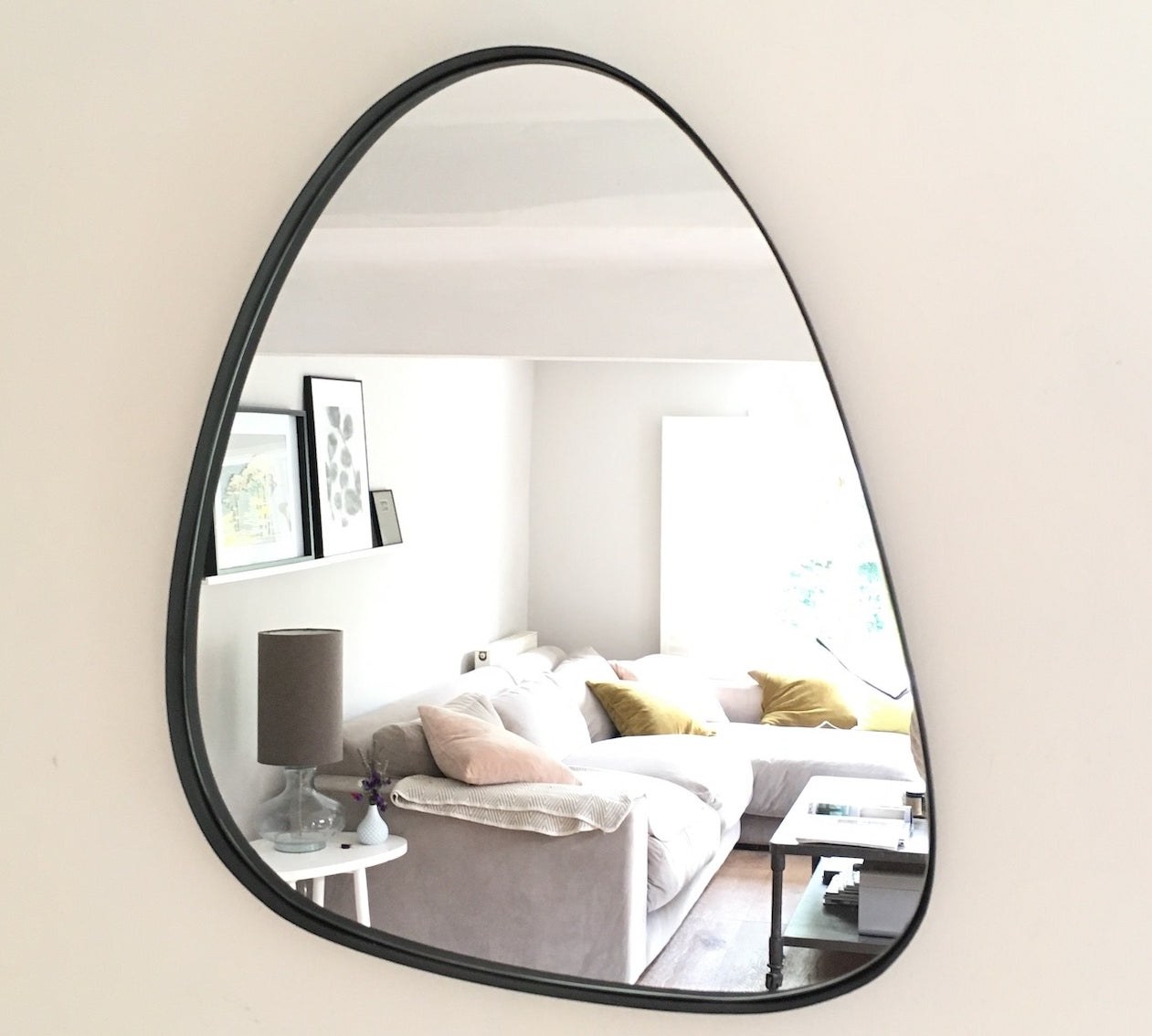 Black pebble shaped mirror