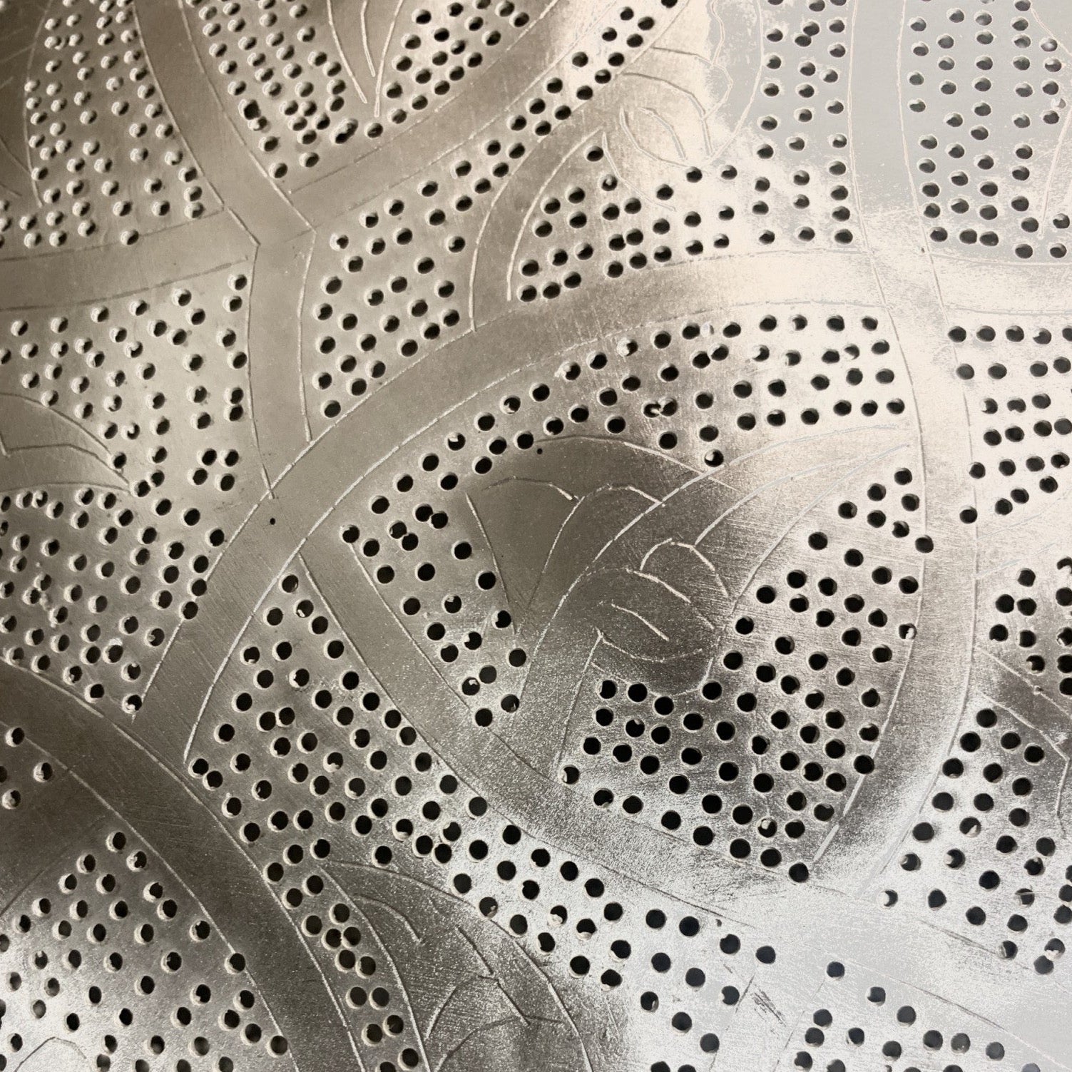 detail of filigrain pendant light