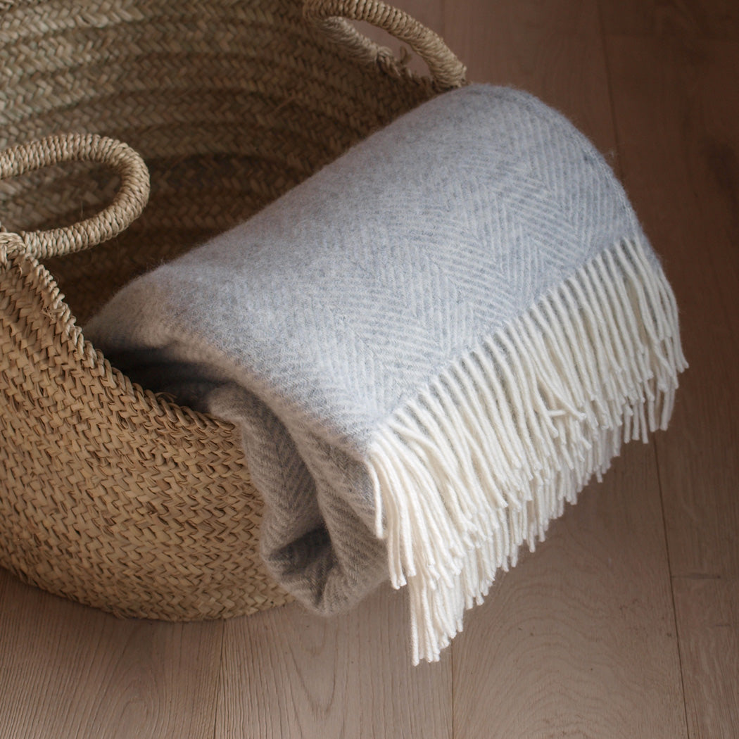 pale grey herringbone wool throw by Tweedmill