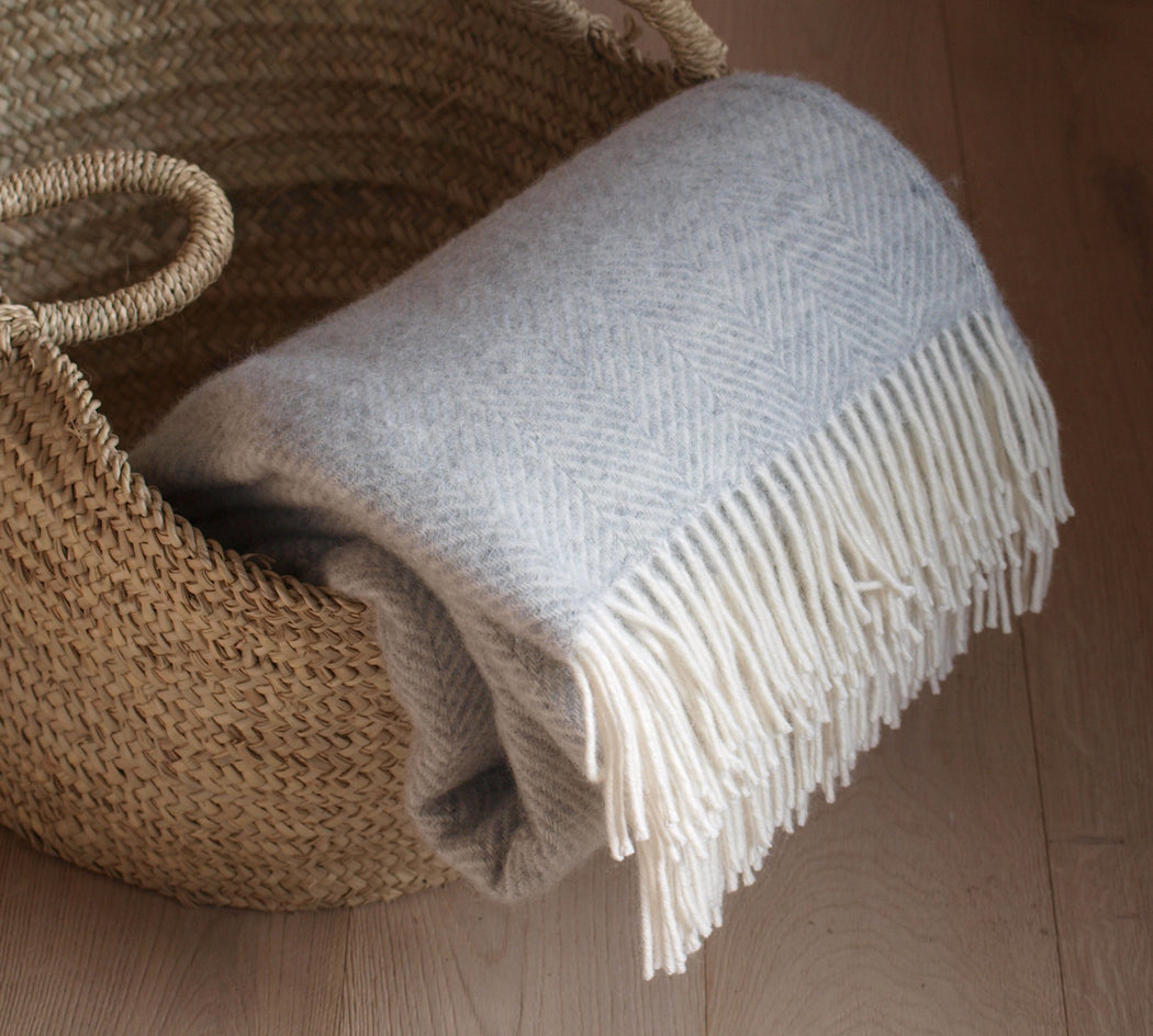 pale grey herringbone wool throw by Tweedmill