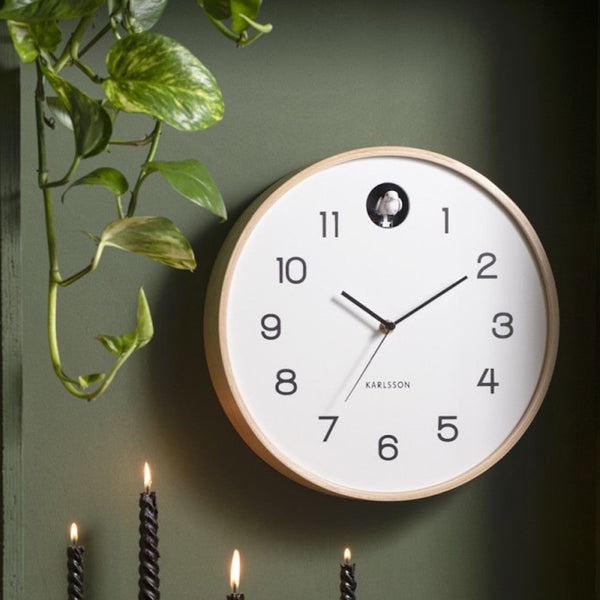 white cuckoo clock by Karlsson